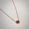 Screenshot Custom Solid 18k Gold Piaget Possession Pendant in 18K Rose Gold Set with 20 Brilliant-Cut Diamonds (approx. 0.28 ct) and Decorated with a Carnelian Cabochon (approx. 0.82 ct) 2 Ways of Wearing