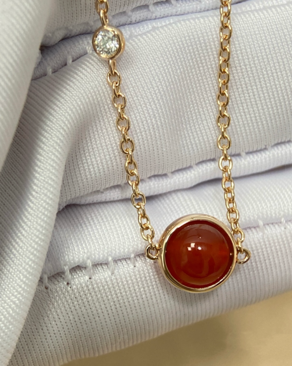 503ef2ff994ccf0e195e2f59cf79f58 Custom Solid 18k Gold Piaget Possession Pendant in 18K Rose Gold Set with a Brilliant-Cut Diamond (approx. 0.06 ct) and a Carnelian Bead