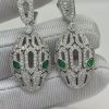 Custom bvlgari Serpenti Seduttori Earrings set with Emerald Eyes and Pavé Diamonds Custom bvlgari Serpenti Seduttori Earrings set with Emerald Eyes and Pavé Diamonds