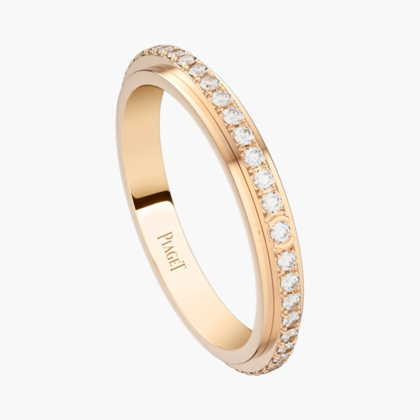 759d4e45-e90c-4e9c-8188-244a1f118270 Custom Solid 18k Gold Piaget Possession Ring in 18K Rose Gold Set with 46 Brilliant-Cut Diamonds (approx. 0.24 ct) and One Possession-Set Brilliant-Cut Diamond (approx. 0.01 ct).