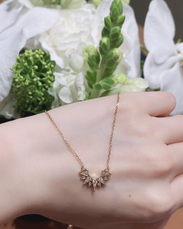 Screenshot Custom Solid 18k Gold Piaget Sunlight Pendant in 18K Rose Gold Set with 16 Brilliant-Cut Diamonds (approx. 0.13 ct)