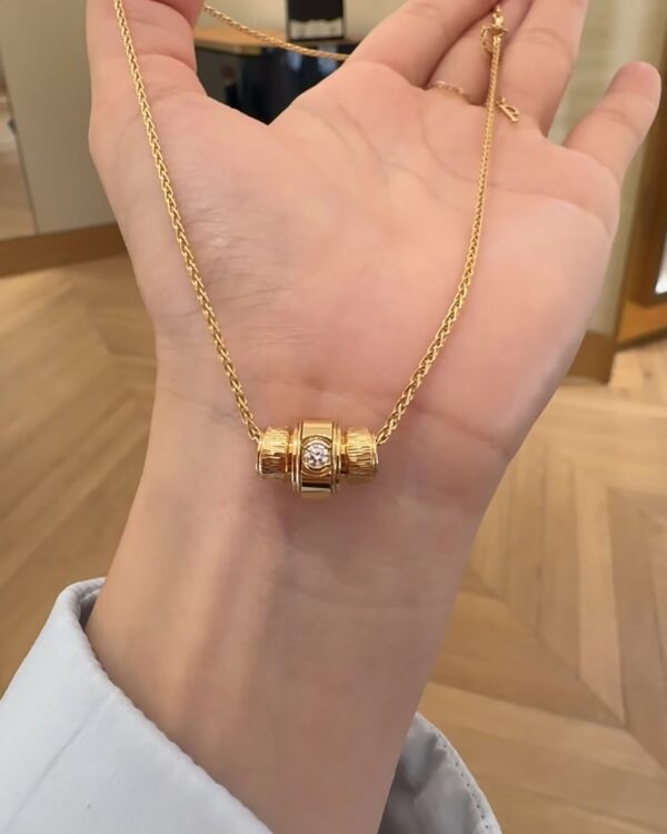 Screenshot Custom Solid 18k Gold Piaget Possession "Decor Palace" Pendant in 18K Rose Gold Set with One Possession-Set Brilliant-Cut Diamond (approx. 0.09 ct)