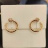 Screenshot Custom Solid 18k Gold Piaget Possession Open Hoop Earrings in 18K Rose Gold Set with 20 Brilliant-Cut Diamonds (approx. 0.20 ct)