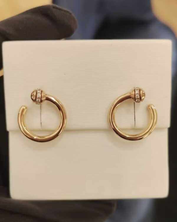 Screenshot Custom Solid 18k Gold Piaget Possession Open Hoop Earrings in 18K Rose Gold Set with 20 Brilliant-Cut Diamonds (approx. 0.20 ct)