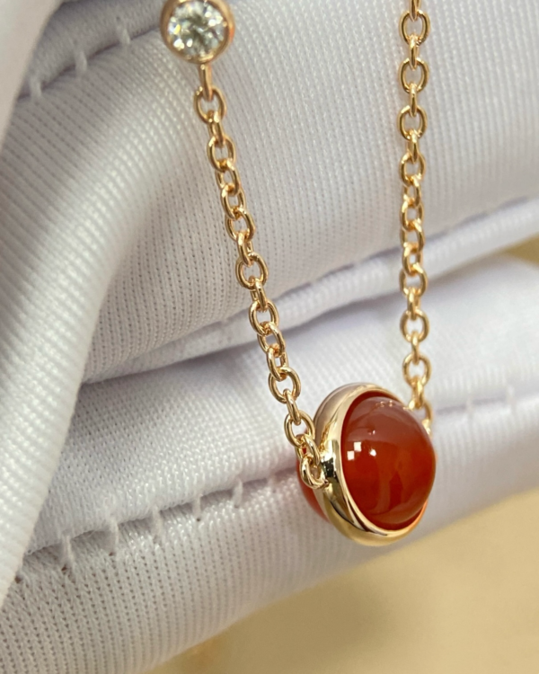 8c8fc7847808bc8418a00f3edbd06b0 Custom Solid 18k Gold Piaget Possession Pendant in 18K Rose Gold Set with a Brilliant-Cut Diamond (approx. 0.06 ct) and a Carnelian Bead