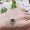 Screenshot Custom Solid 18k Gold Piaget Sunlight Pendant in 18K Rose Gold Set with a Malachite (approx. 2.30 cts) and 28 Brilliant-Cut Diamonds (approx. 0.17 ct)