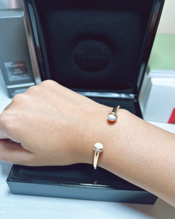 Screenshot Custom Solid 18k Gold Piaget Possession Open Bangle Bracelet in 18K Rose Gold Set with 30 Brilliant-Cut Diamonds