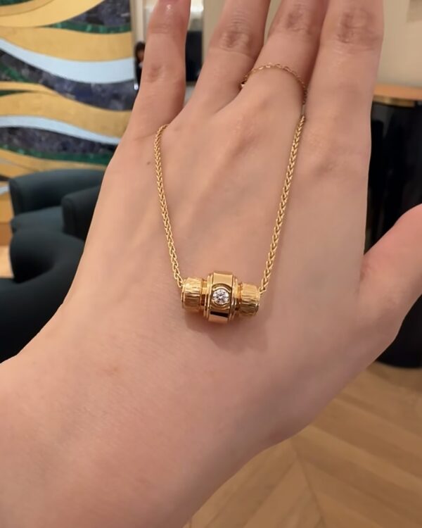 Screenshot Custom Solid 18k Gold Piaget Possession "Decor Palace" Pendant in 18K Rose Gold Set with One Possession-Set Brilliant-Cut Diamond (approx. 0.09 ct)