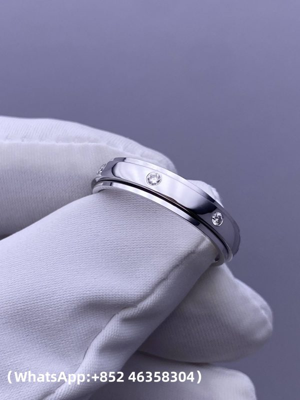 Custom Solid 18k Gold Piaget Jewelry Possession Ring in Rhodium Finish Set with 7 Brilliant-Cut Diamonds Custom Solid 18k Gold Piaget Jewelry Possession Ring in Rhodium Finish Set with 7 Brilliant-Cut Diamonds