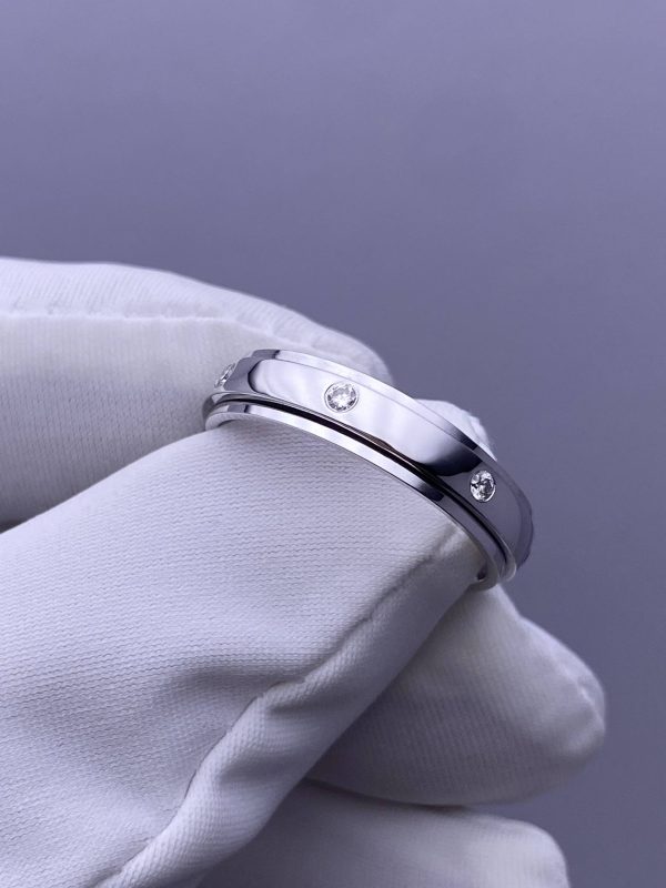 Custom Solid 18k Gold Piaget Jewelry Possession Ring in Rhodium Finish Set with 7 Brilliant-Cut Diamonds Custom Solid 18k Gold Piaget Jewelry Possession Ring in Rhodium Finish Set with 7 Brilliant-Cut Diamonds