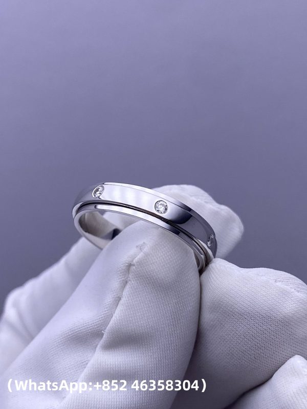 Custom Solid 18k Gold Piaget Jewelry Possession Ring in Rhodium Finish Set with 7 Brilliant-Cut Diamonds Custom Solid 18k Gold Piaget Jewelry Possession Ring in Rhodium Finish Set with 7 Brilliant-Cut Diamonds