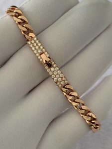 Custom Solid Hermes Bracelet in Rose Gold Set with Diamonds and Kelly Clasp