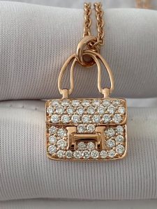 Custom Solid 18k Gold Hermes Pendant in Rose Gold Set with Diamonds and Kelly Snap Closure