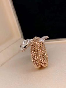 Custom Solid 18k Gold Bulgari Jewelry Serpenti Two-Coil Ring Set with Pavé Diamonds on the Head and Tail And Black Onyx Eyes