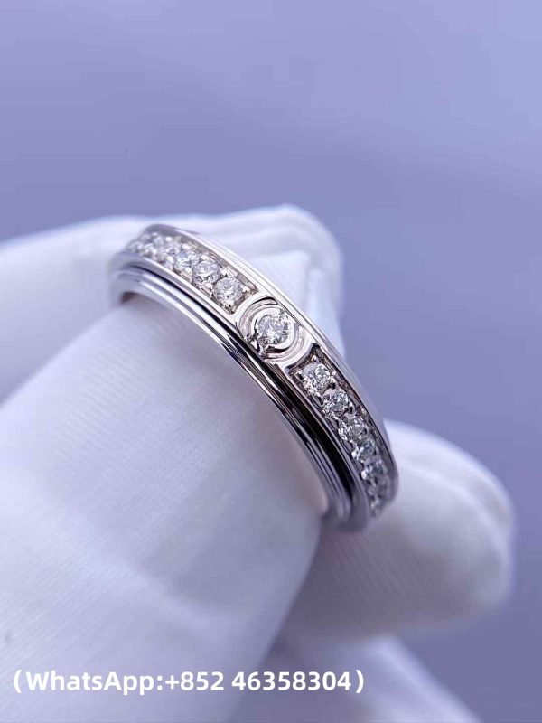 Custom Solid 18k Gold Piaget Jewelry Possession Ring in rhodium finish set with 36 brilliant-cut diamonds and one Possession-set brilliant-cut diamond Custom Solid 18k Gold Piaget Jewelry Possession Ring in rhodium finish set with 36 brilliant-cut diamonds and one Possession-set brilliant-cut diamond