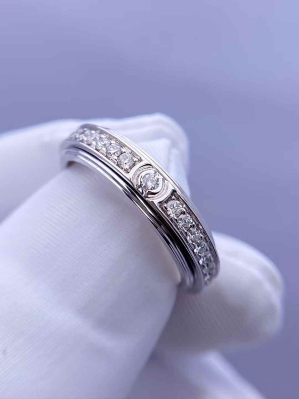 Custom Solid 18k Gold Piaget Jewelry Possession Ring in rhodium finish set with 36 brilliant-cut diamonds and one Possession-set brilliant-cut diamond Custom Solid 18k Gold Piaget Jewelry Possession Ring in rhodium finish set with 36 brilliant-cut diamonds and one Possession-set brilliant-cut diamond