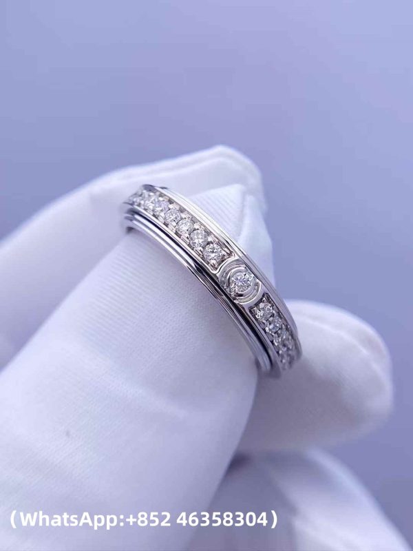 Custom Solid 18k Gold Piaget Jewelry Possession Ring in rhodium finish set with 36 brilliant-cut diamonds and one Possession-set brilliant-cut diamond Custom Solid 18k Gold Piaget Jewelry Possession Ring in rhodium finish set with 36 brilliant-cut diamonds and one Possession-set brilliant-cut diamond