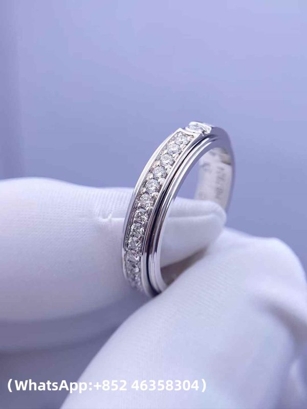 Custom Solid 18k Gold Piaget Jewelry Possession Ring in rhodium finish set with 36 brilliant-cut diamonds and one Possession-set brilliant-cut diamond Custom Solid 18k Gold Piaget Jewelry Possession Ring in rhodium finish set with 36 brilliant-cut diamonds and one Possession-set brilliant-cut diamond