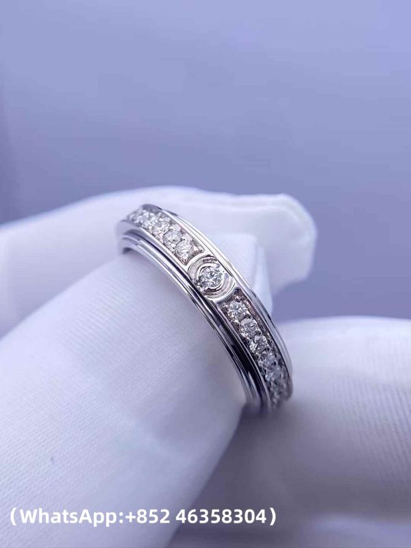 Custom Solid 18k Gold Piaget Jewelry Possession Ring in rhodium finish set with 36 brilliant-cut diamonds and one Possession-set brilliant-cut diamond Custom Solid 18k Gold Piaget Jewelry Possession Ring in rhodium finish set with 36 brilliant-cut diamonds and one Possession-set brilliant-cut diamond